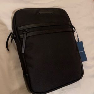 Cole haan messenger water proof resistant zip